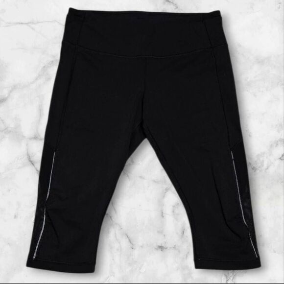 Lululemon Size 12 Black Leggings with Mesh Inserts - Picture 1 of 2